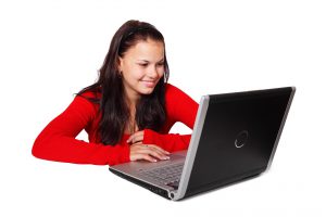 Image of woman working on notebook